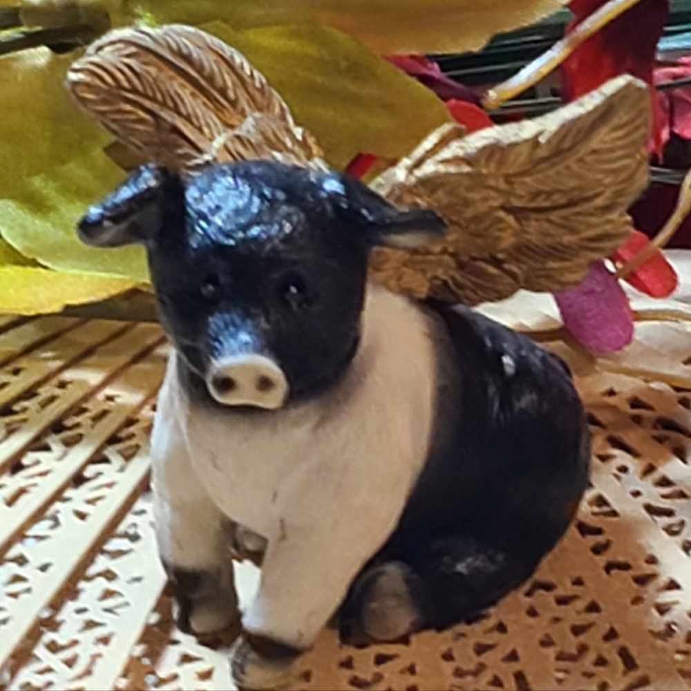 Black and White Winged Pig Figurine With Gold Wings